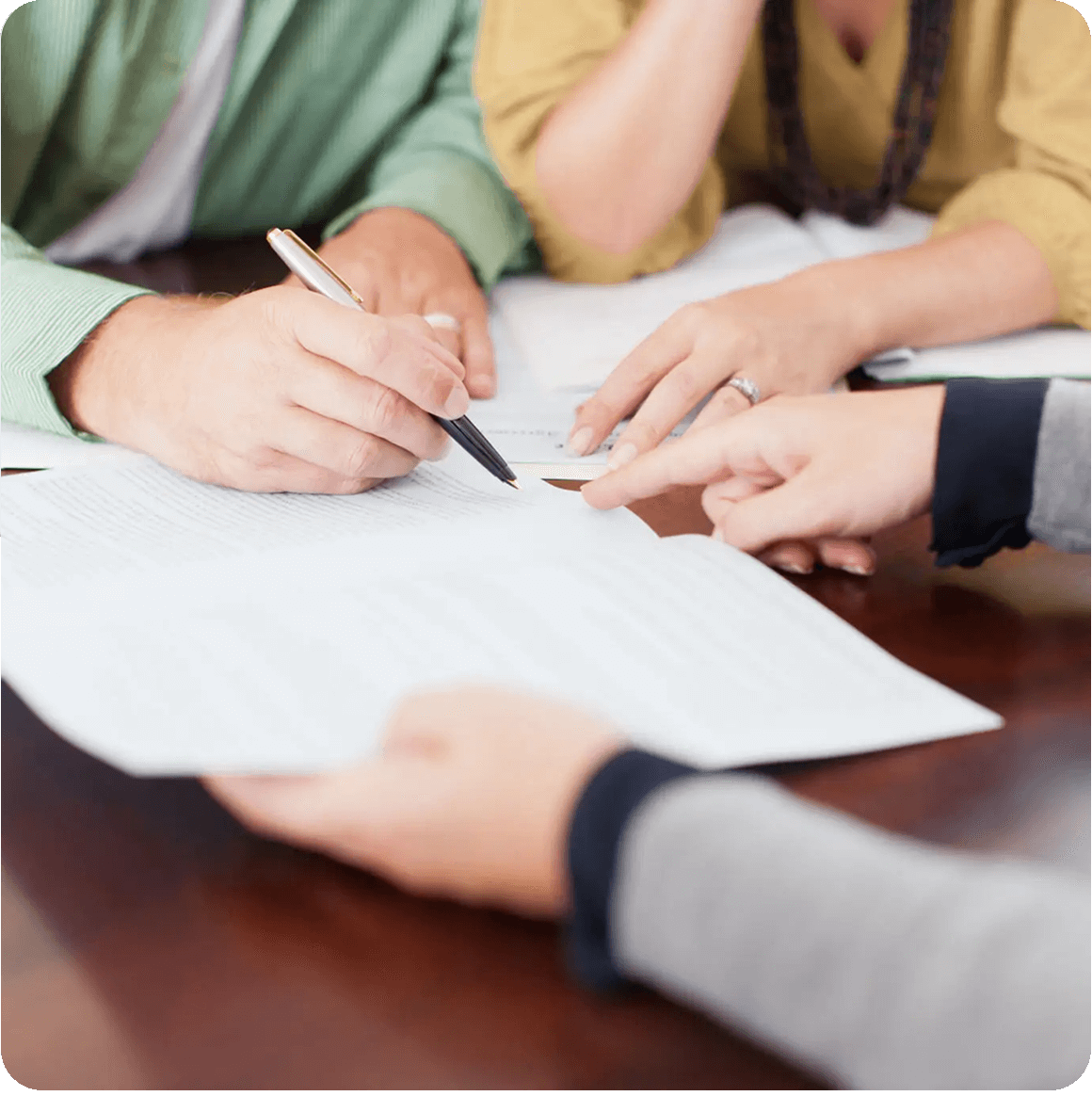 People reviewing paperwork together